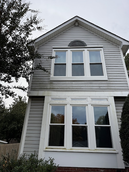 Charlotte, North Carolina home before being soft washing by CLT Property Detailing & Pressure Washing.