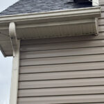 Charlotte Highland Creek Neighborhood Home's clean exterior gutter face after a Soft House Wash.
